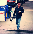 Joe walking with his camera